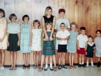 Shiela, Winde Campbell, Susan Hinton, Jenny Campbell, Pam Flagg with arms around Leslie, Mary Van Hinton with Arms on Rusty, Karen and three unknown boys