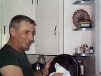 May 1968 - Van Hinton wiping dishes. Taken in the kitchen