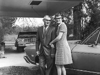 Van & Elizabeth Hinton in the carport at their house