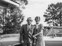 Van & Elizabeth Hinton in the carport at their house