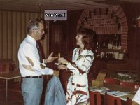 Susan gets an award at a Toastmaster's meeting